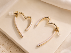 Gold and white heart hoop earrings